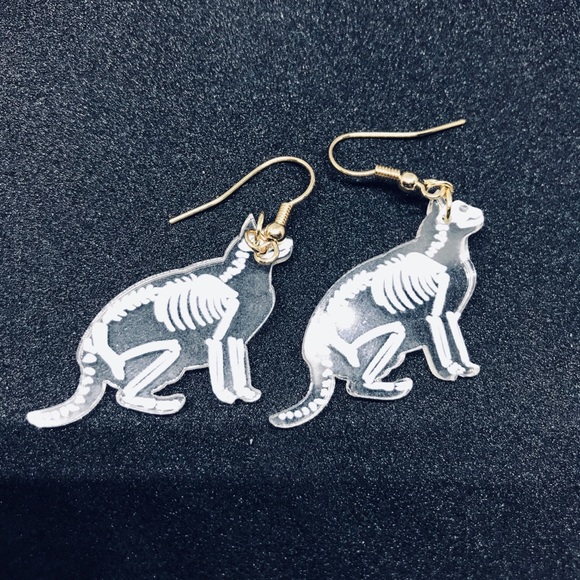 Acrylic cat skeleton x ray earrings. - Picture 2 of 7